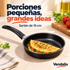 Sartén negro de 16 cm con porción individual; portada Vendalia. Los alimentos ilustran el uso y no se incluyen.