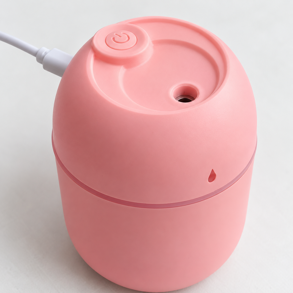 Humidificador mini rosa con alimentación USB — detalle