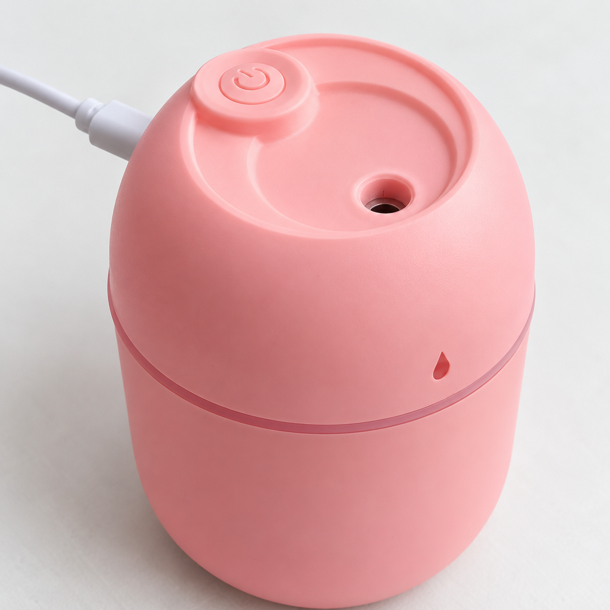 Humidificador mini rosa con alimentación USB — detalle