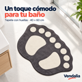 Tapete gris de baño con huellas crema — portada Vendalia
