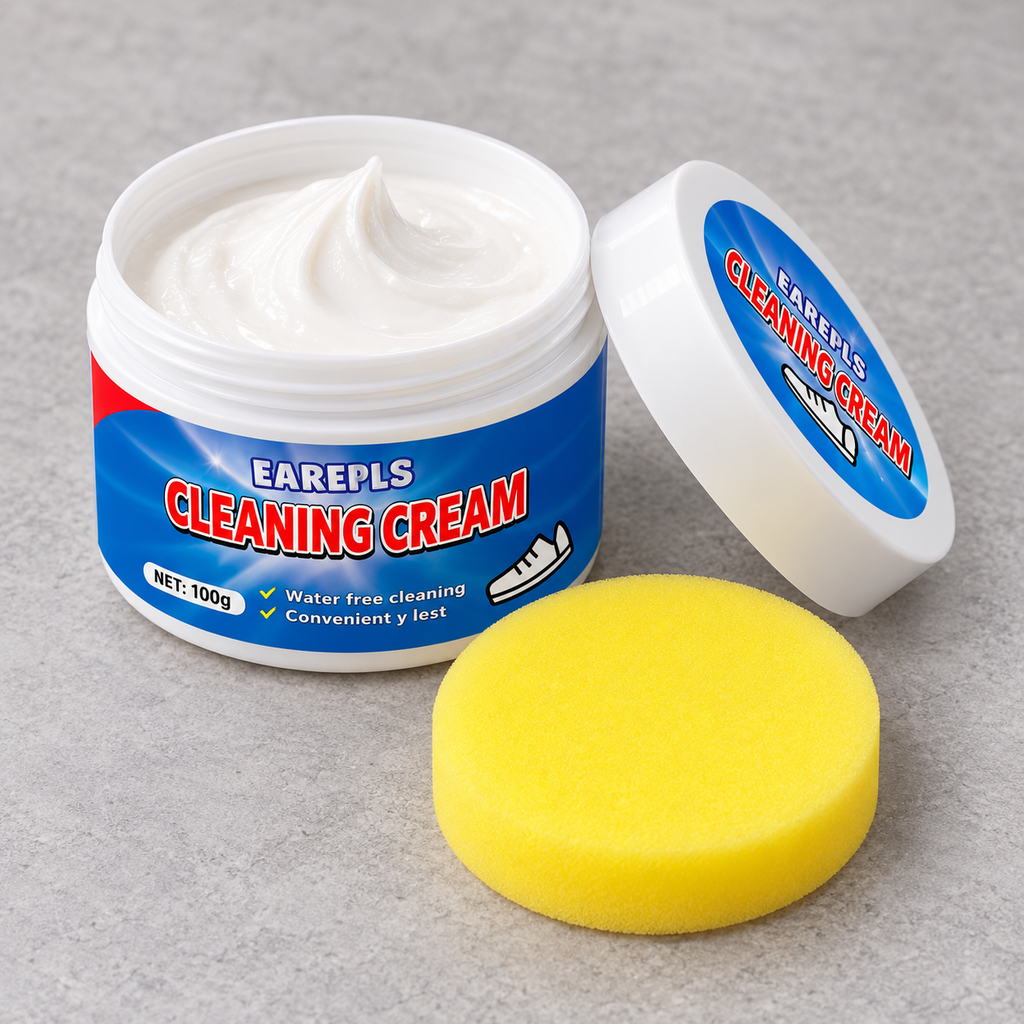 Crema limpiadora abierta con tapa y esponja aplicadora amarilla.