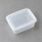 Contenedor transparente con tapa de 200 ml aproximados — vista de detalle o uso