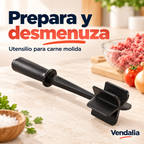 Utensilio negro para desmenuzar carne. Vendalia.
