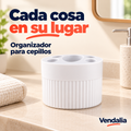 Organizador cilíndrico blanco para baño con divisiones para cepillos.
