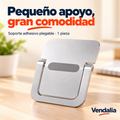 Soporte adhesivo plegable plateado para laptop; venta por pieza.