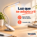 Lámpara LED blanca con clip, brazo flexible y conexión USB.