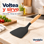 Espátula negra con mango de madera. Portada Vendalia.