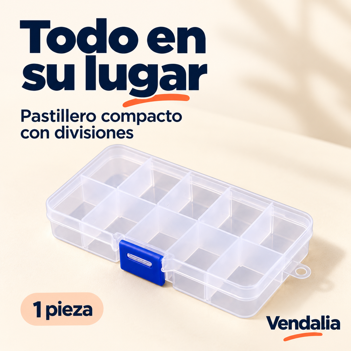 Pastillero transparente con divisiones y broche azul, portada — Vendalia