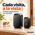 Timbre inalámbrico negro con receptor LED y botón transmisor.