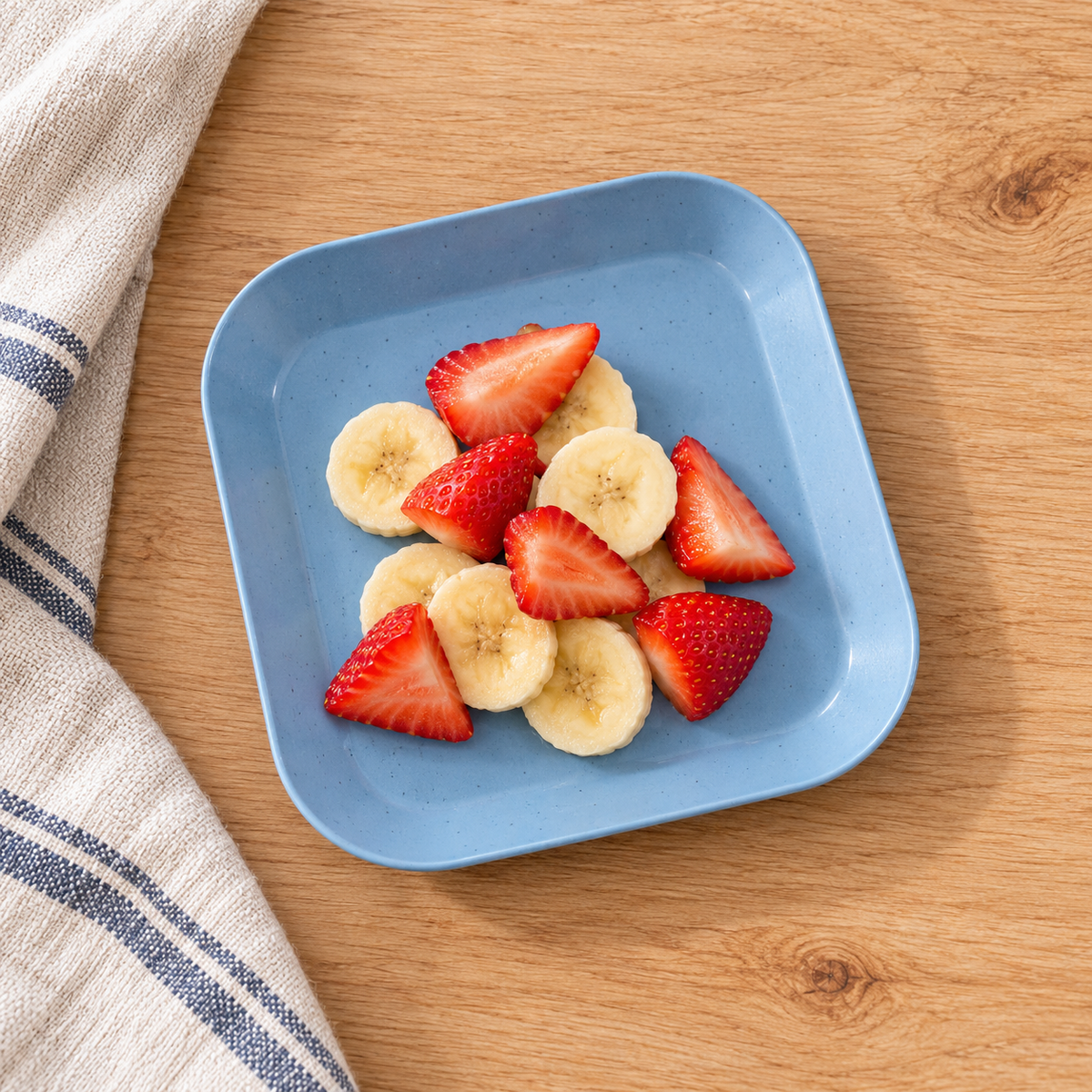 Plato cuadrado azul · vista superior con fruta no incluida