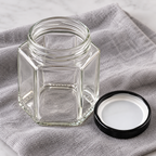 Frasco de vidrio hexagonal · vista de detalle · SKU 54305