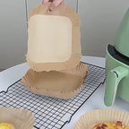 Demostración de moldes de papel para freidora de aire; accesorios no incluidos.