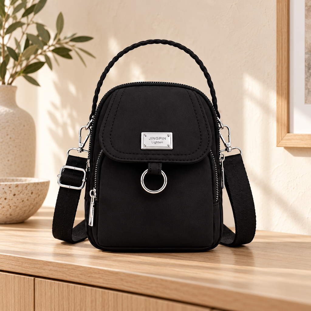 Mini Bolsa Crossbody Negra Casual en ambiente de hogar — Vendalia