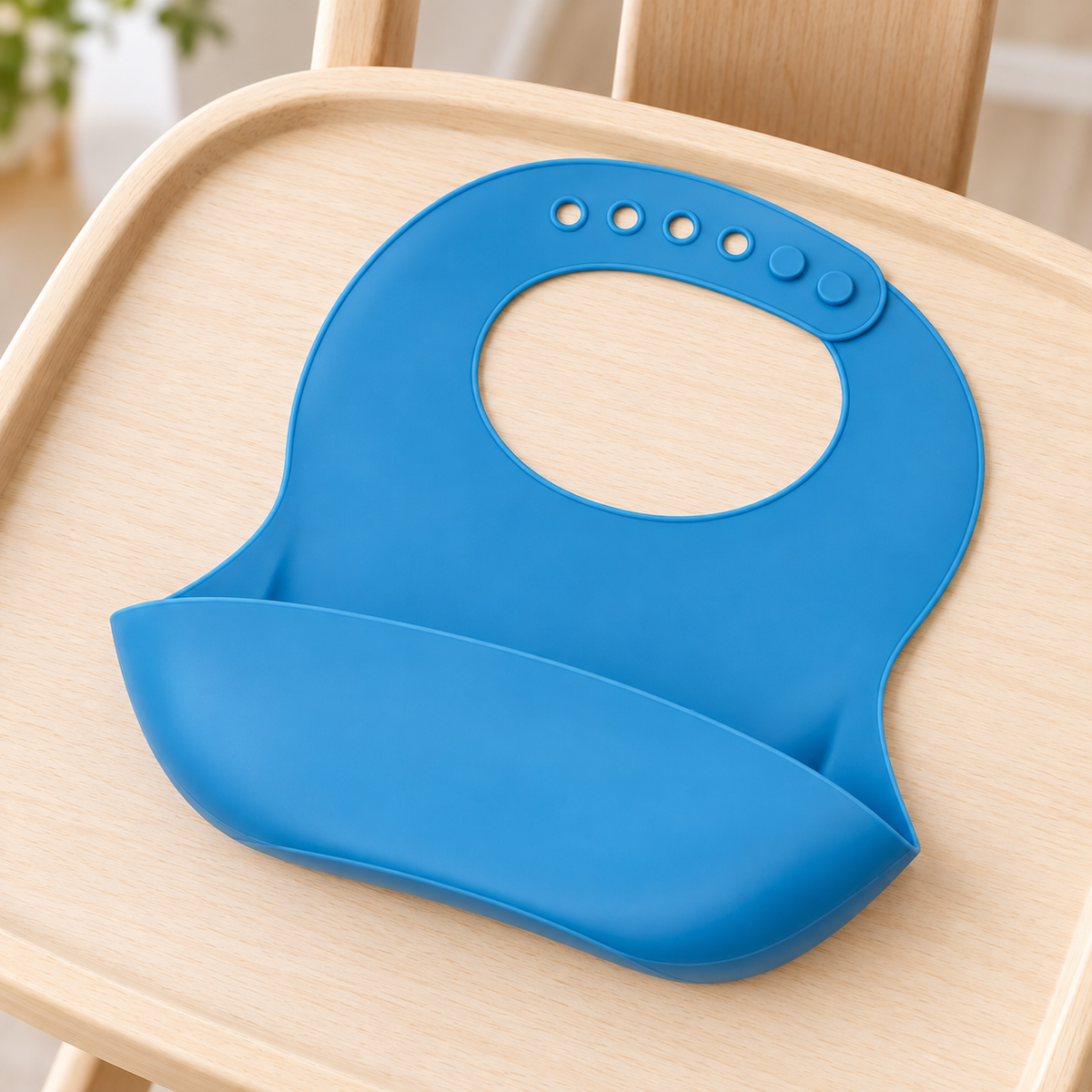 Babero de Silicón Impermeable con Bolsillo en ambiente Vendalia