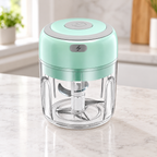 Mini Picador Eléctrico en ambiente de hogar — Vendalia. La fotografía muestra un ejemplo en verde menta; el color puede ser blanco o verde menta y se envía al azar según disponibilidad.