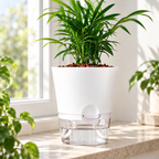 Maceta Autorriego 20 cm en ambiente de hogar — Vendalia. La fotografía muestra una sugerencia de uso. La planta, las flores y los objetos decorativos no están incluidos.