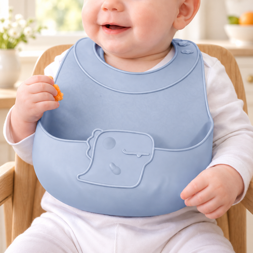 Babero Infantil de Silicona Azul; accesorios de ambientación no incluidos