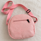 Bandolera rosa — bolsillo trasero