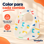 Babero de tela con figuras geométricas multicolor · Vendalia