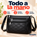 Bolsa negra con bordado y cierres — presentación Vendalia
