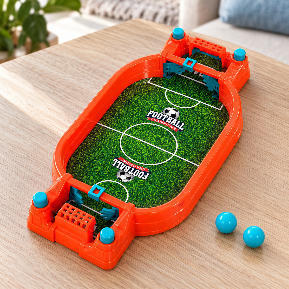 Juego de Fútbol de Mesa para Niños en ambiente de hogar — Vendalia. Fotografía de detalle de la cancha con dos pelotas; no muestra todos los accesorios del juego.