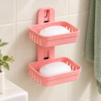 Jabonera Doble de Pared con Drenaje (rosa) en ambiente de hogar — Vendalia. Los jabones se muestran como ambientación y no están incluidos.
